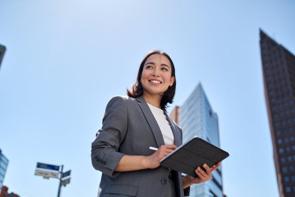 woman holding a tablet