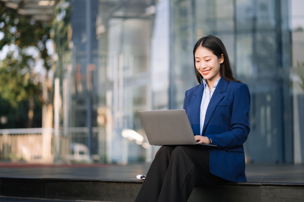 girl checking laptop